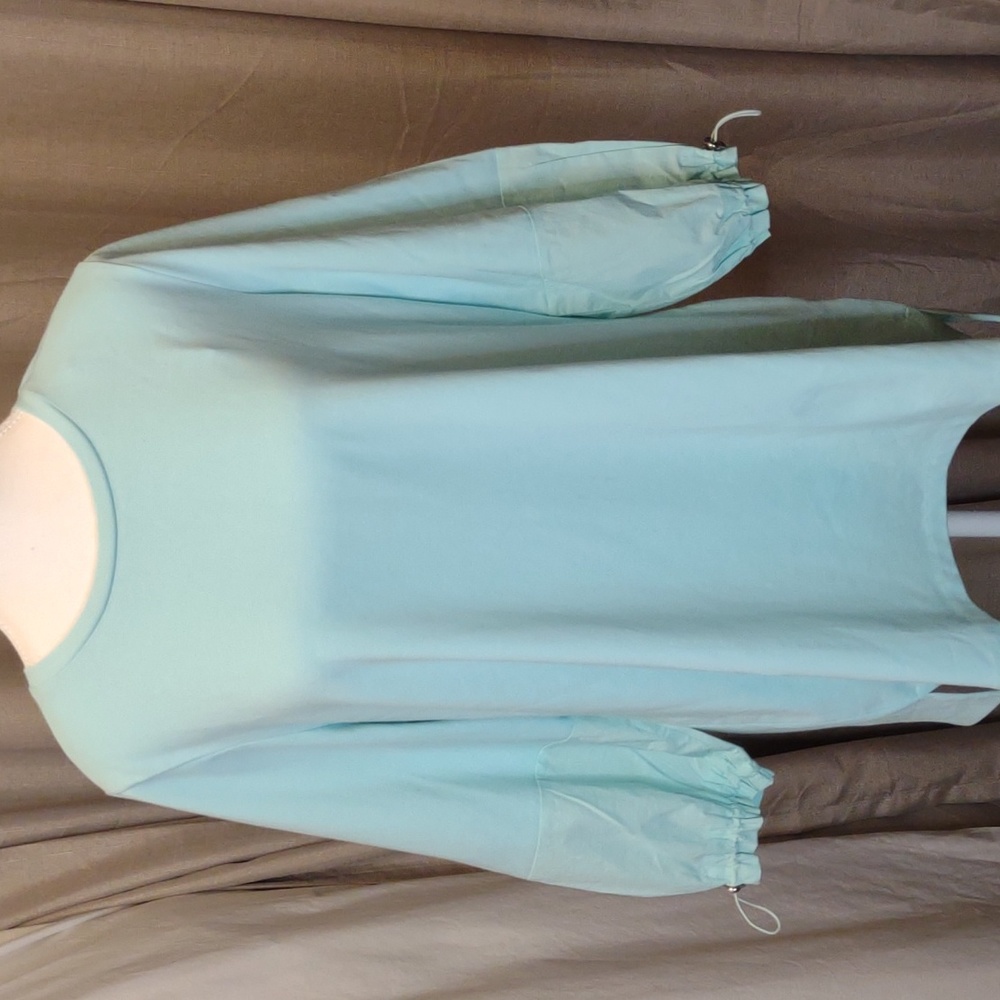 E.L.I. exciting, luxurious, irresistible 3/4 sleeve top